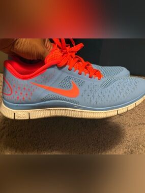 Nike Women’s Light Blue and Bright Orange Running Sneakers
